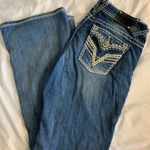 Like new. White stitching jeans